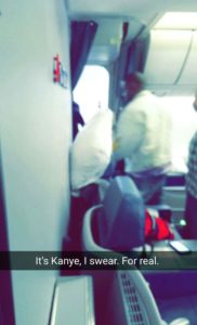 Kanye West exits the Delta One cabin of a 767-300ER