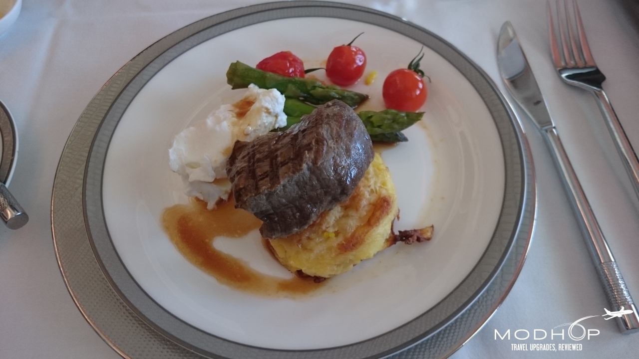 Singapore Airlines First Class Suite brunch entree. - Steak and poached egg.