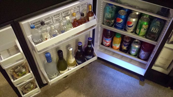 Don't touch! All items in the minibar are connected to sensors and charge the room as soon as you pull them out. No more pouring water into vodka bottles and putting them back in. Drat. Booze and sodas. Minibar.
