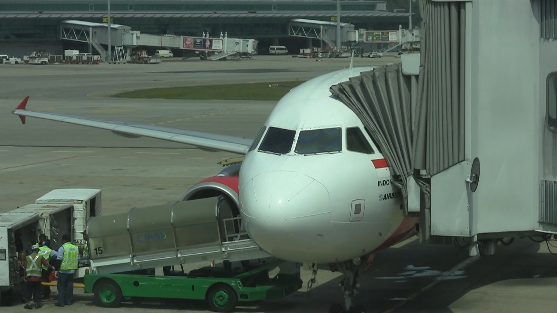 a plane being loaded onto a ramp