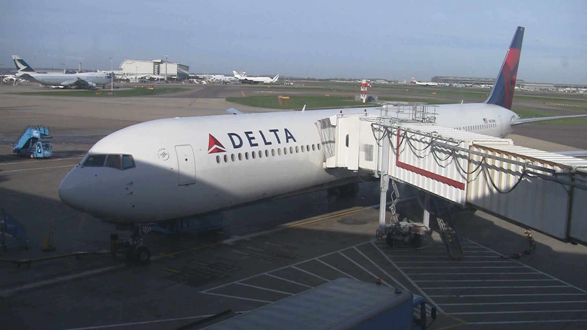 a large white airplane at an airport