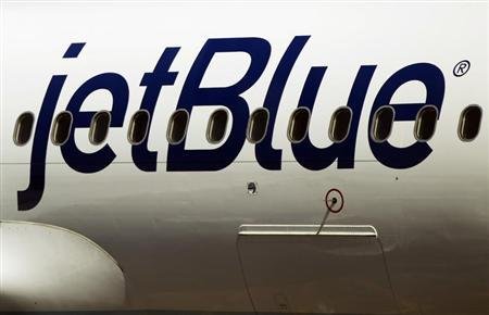 close-up of a jetblue logo on a plane