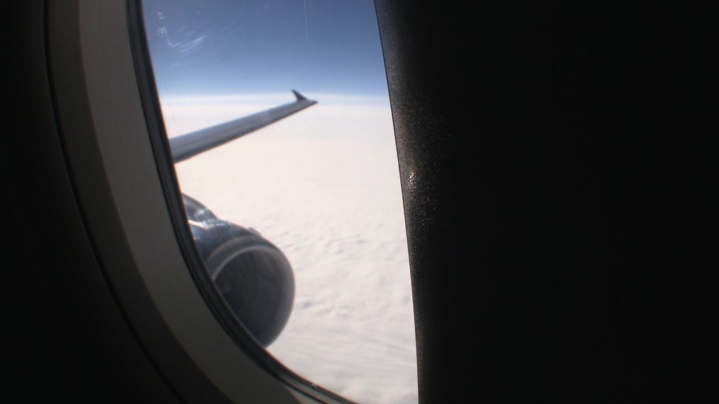 a view of the wing of an airplane from a window