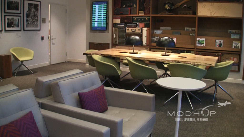 Loungers and Communal table inside this American Express Lounge "The Centurion" at New York LaGuardia
