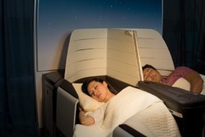 Snoozing in your Hawaiian Airlines Business Class Seat