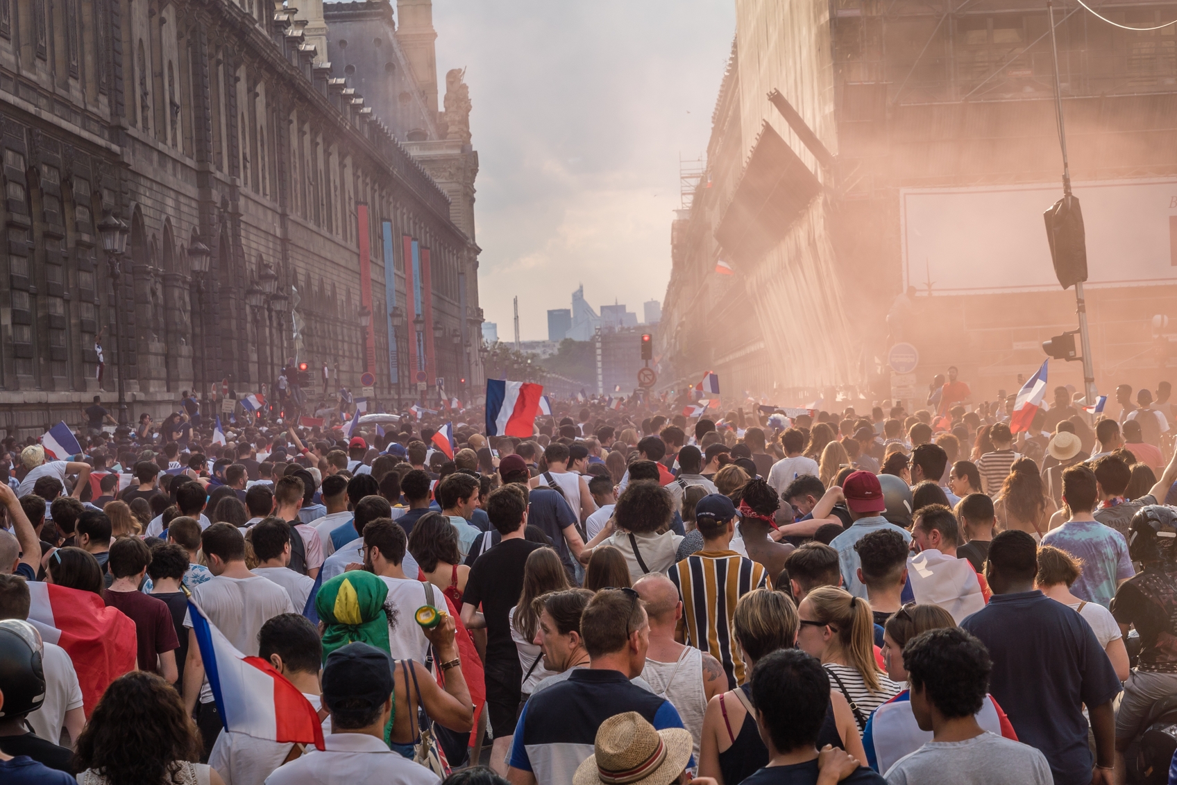 a large crowd of people in a city