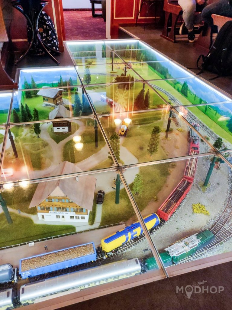 a model train on a glass table
