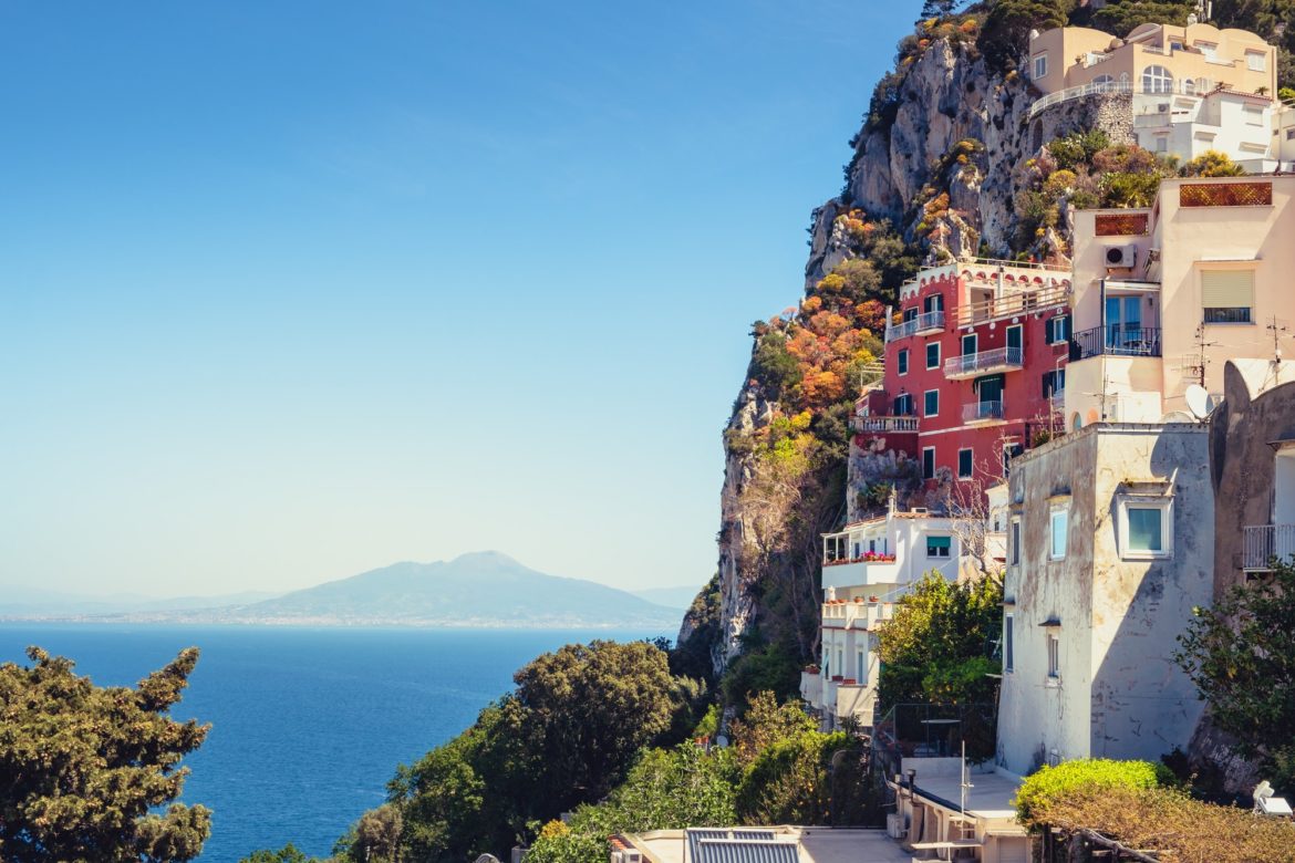 Scenic view of colorful houses on Capri island with Vesuvio background