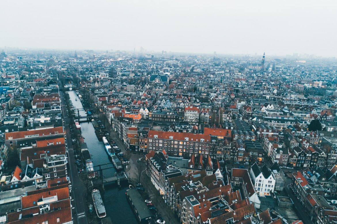 Amsterdam.Flying over european city.