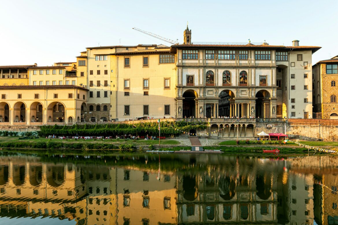 facades of traditional italian buildings by the river Arno, Florence, Tuscany, Italy