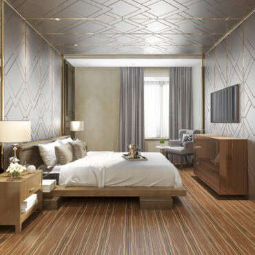 a bedroom with a bed and a chair - modhop's hotel room upgrade tips