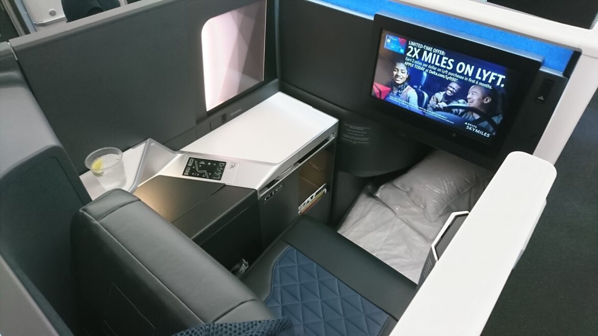 flying business clases for the first time with a tv and a monitor in a business class