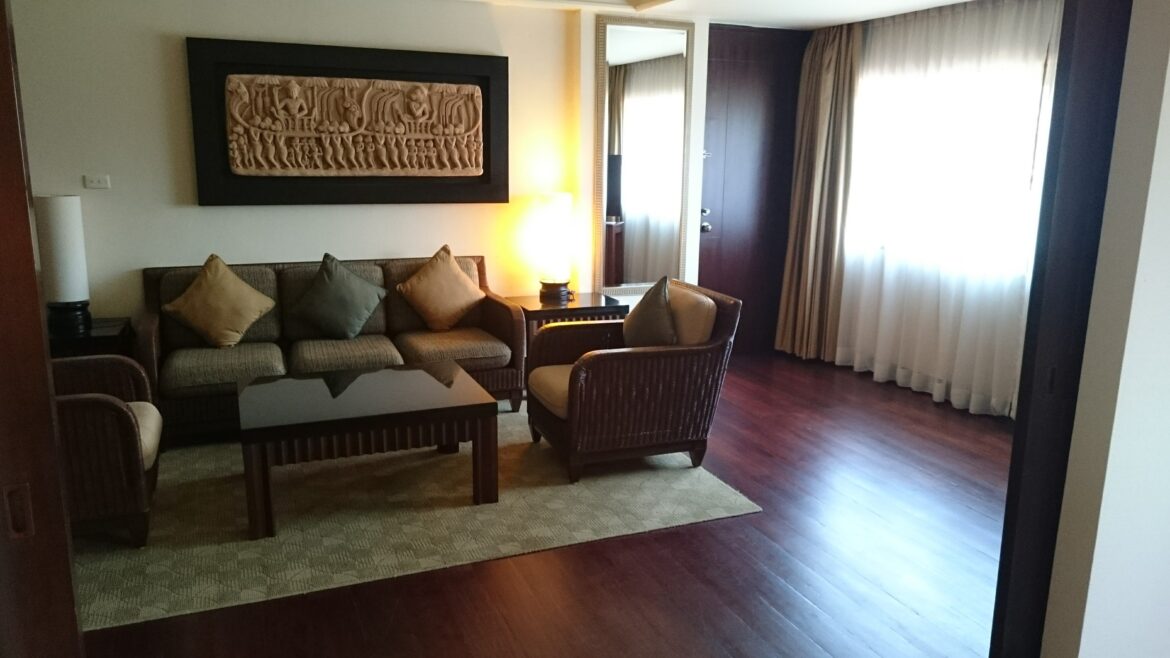 a living room with a couch and a coffee table