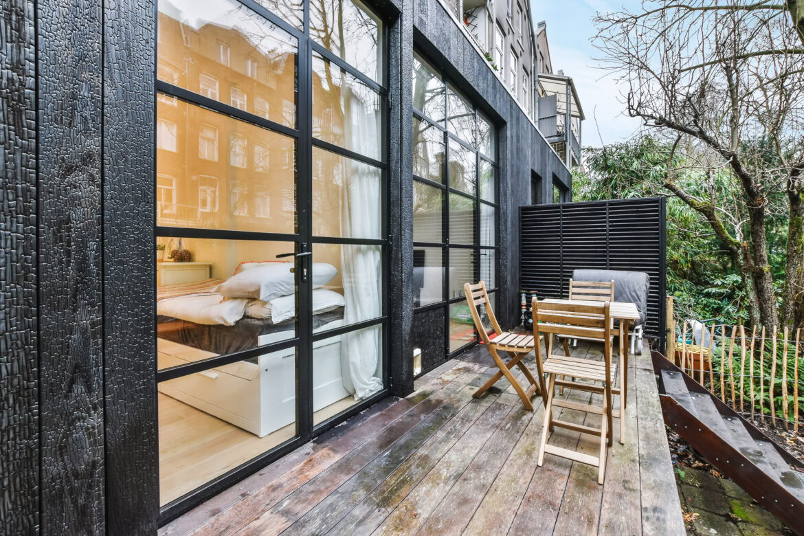 Airbnb monthly discount result could mean a nice woodsy deck like this one