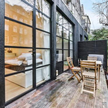 Airbnb monthly discount result could mean a nice woodsy deck like this one