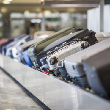 airline baggage fees 2026 checked bag fee comparison chart Delta United American Southwest JetBlue Alaska