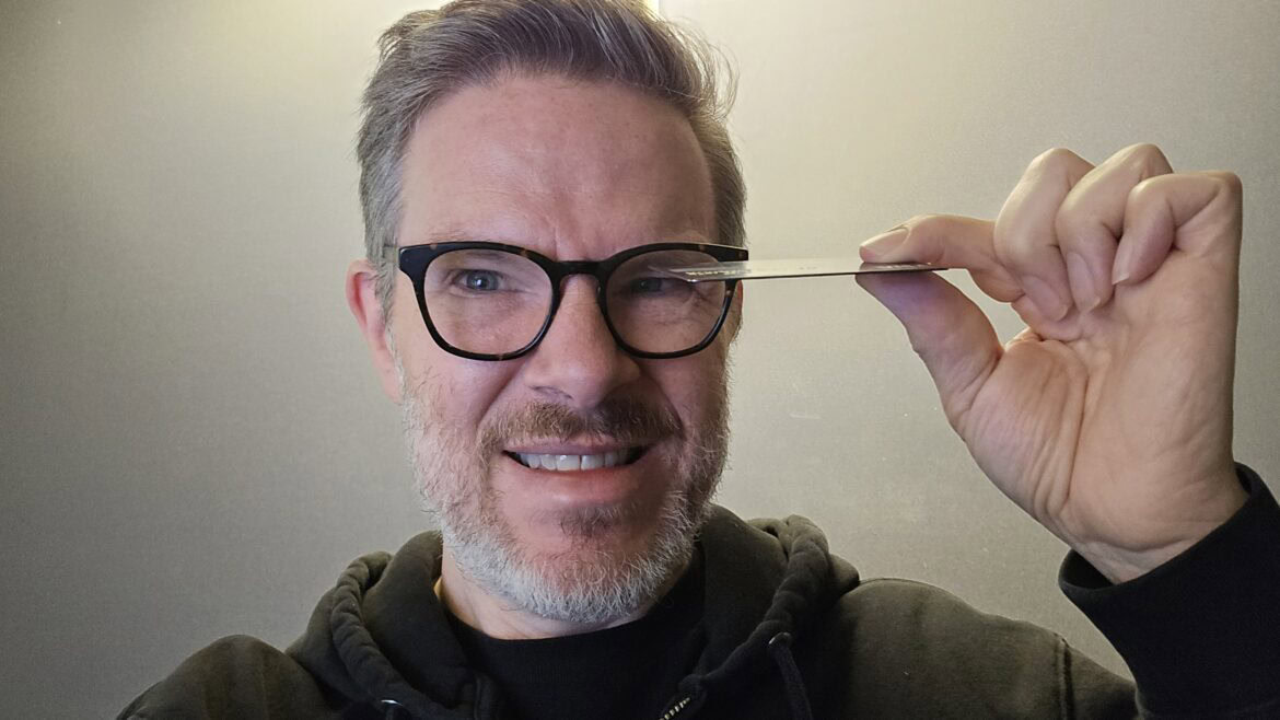 Is Chase Sapphire Reserve worth it in 2026? Jake holds up his card to see.