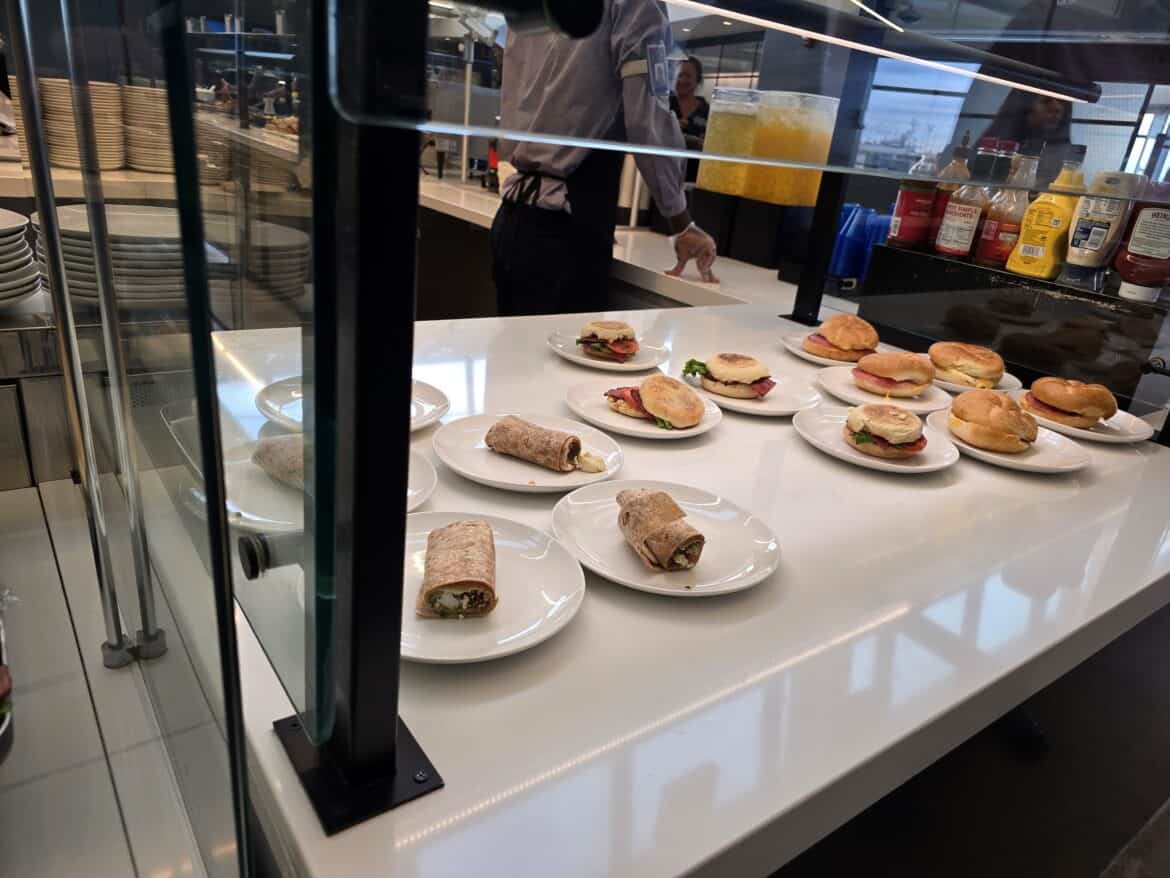 Your first lounge visit may have a good selection of food like this variety of sandwiches.