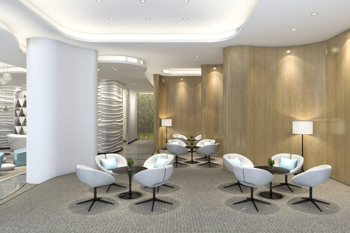 An empty set of chairs neatly arranged for your first airport lounge visit.