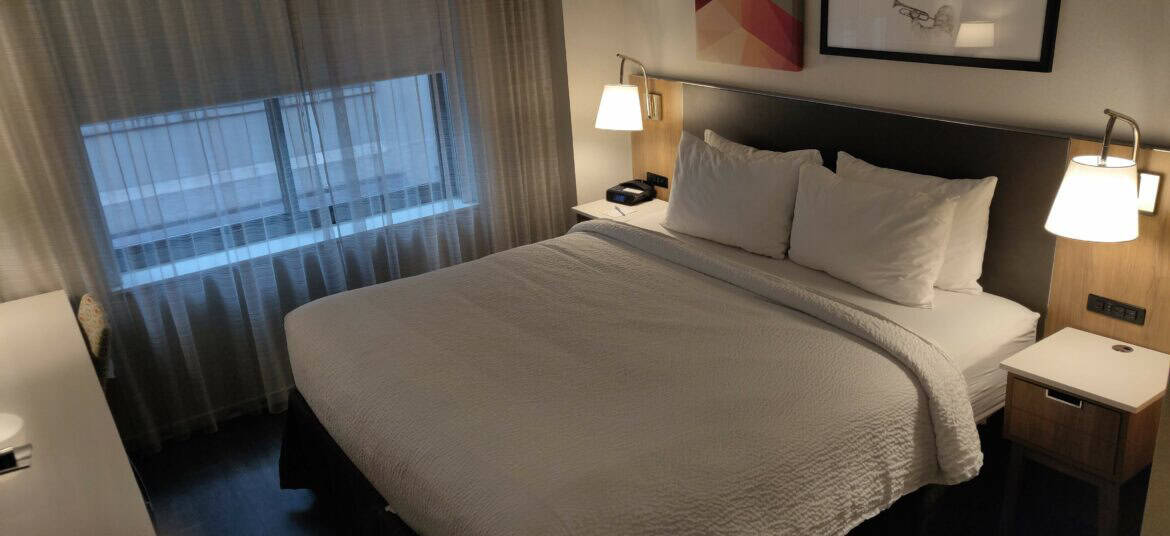 Small hotel room in Manhattan but with plenty of add-ons for elite. So what's the verdict pitting Marriott vs Hyatt?