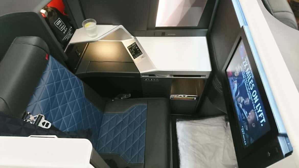 Imagine this Delta One suite aboard the A350 as Delta Basic Business. You didn't get to choose it and you dropped money on luggage, but it's still a pretty nice way to fly.